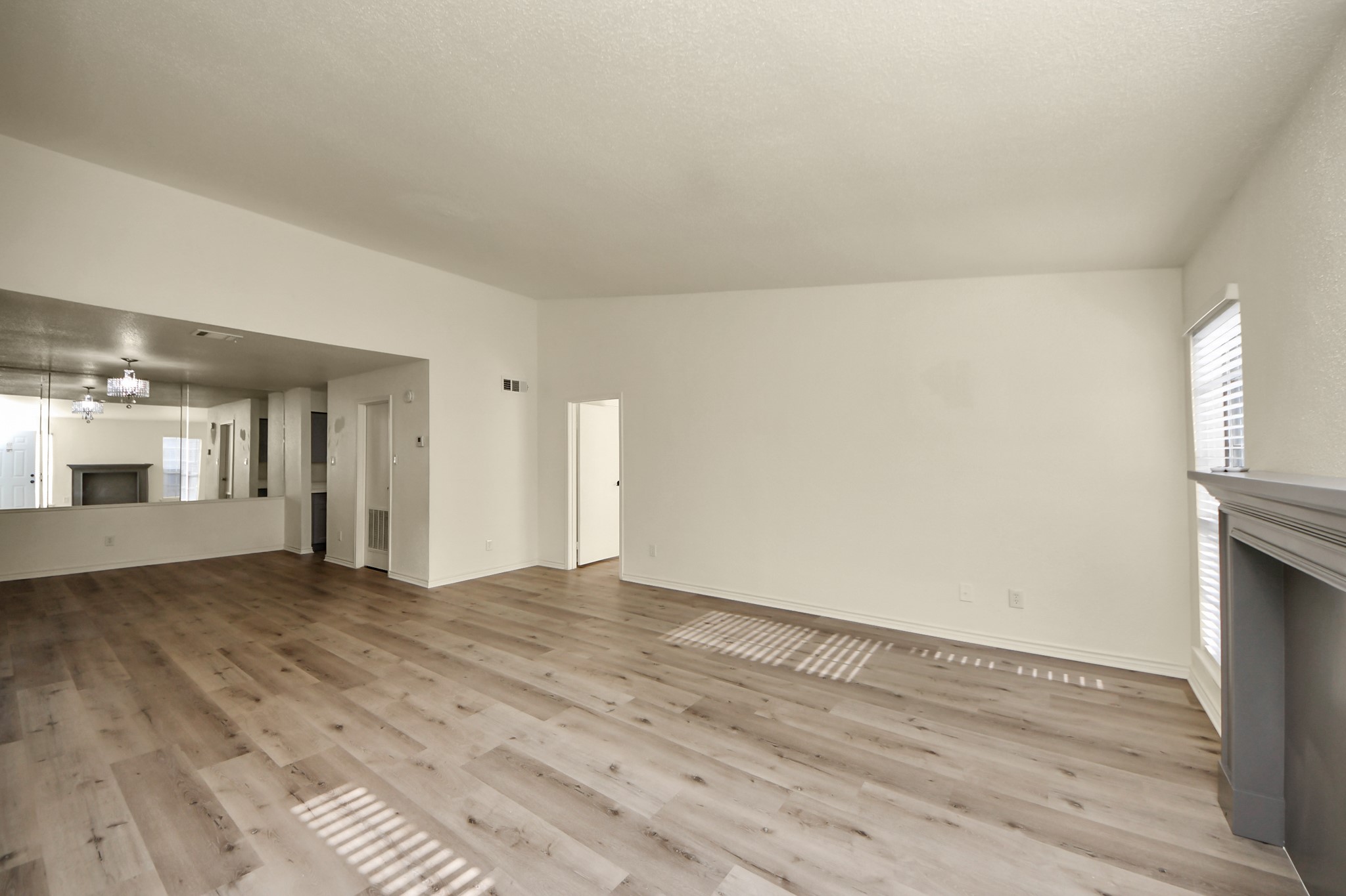 6500 Sands Point Drive, Unit 804 Houston, TX 77074 - Photo 10 of 40 a view of empty room with wooden floor