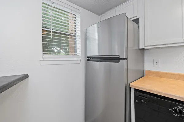 a view of a window in an empty room