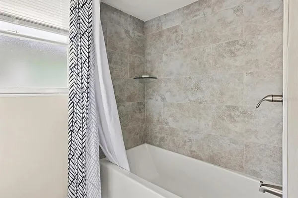 a bathroom with a bathtub