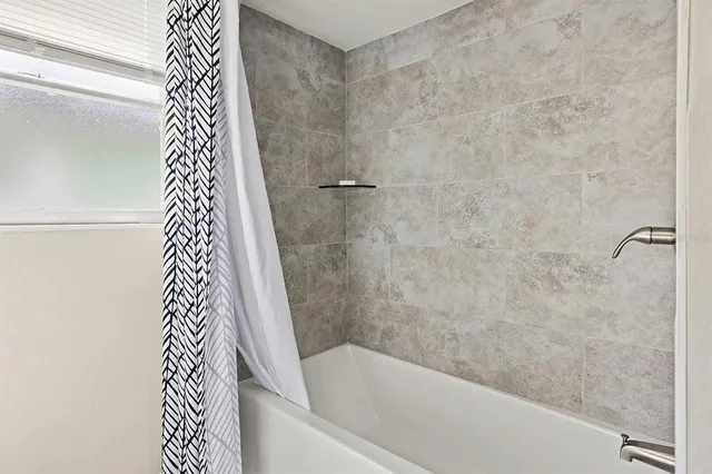 a bathroom with a bathtub