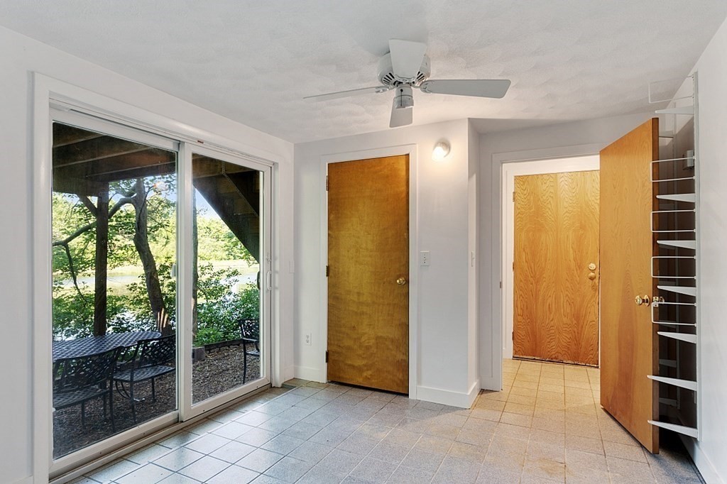 71 Mill Road Littleton, MA 01460 - Photo 23 of 30 wooden floor in an empty room with a window