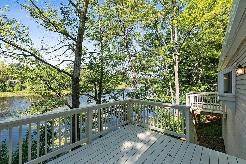 71 Mill Road Littleton, MA 01460 - Photo 7 of 30 a view of a balcony with wooden floor