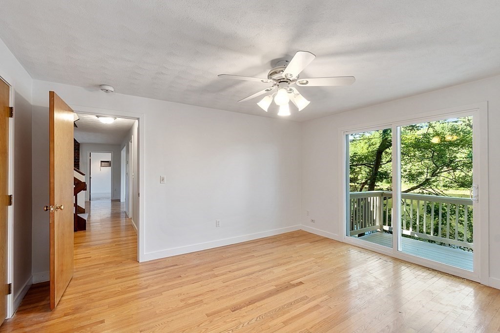 71 Mill Road Littleton, MA 01460 - Photo 9 of 30 wooden floor in an empty room with a window