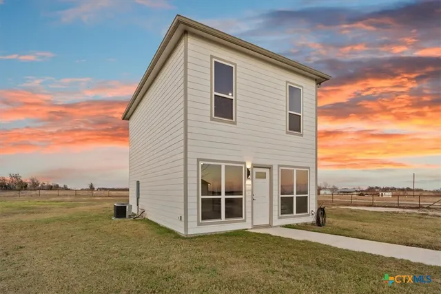 a view of a house with a ocean view