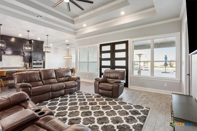 a living room with furniture and a window