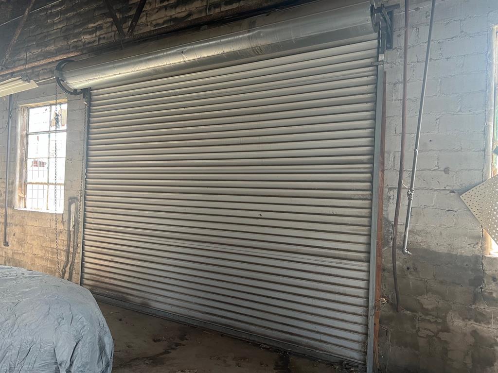 1030 4th Street Graham, TX 76450 - Photo 6 of 6 a view of a room with a white wooden cabinets