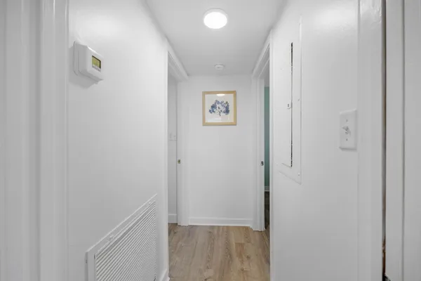 a view of a house with basketball court