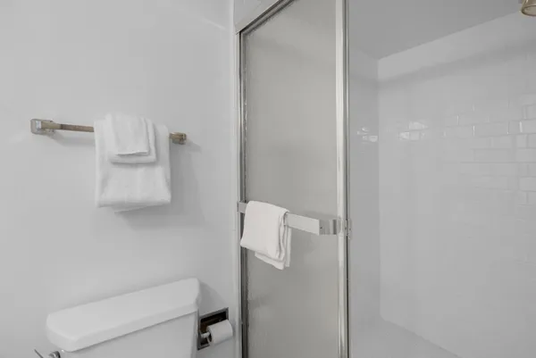 a en suite bathroom with a sink and a mirror