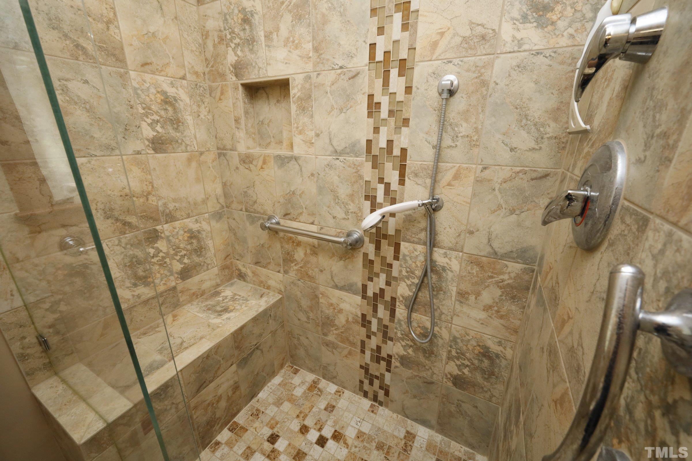 11468 Claybank Place Raleigh, NC 27613 - Photo 20 of 34 a bathroom with a shower