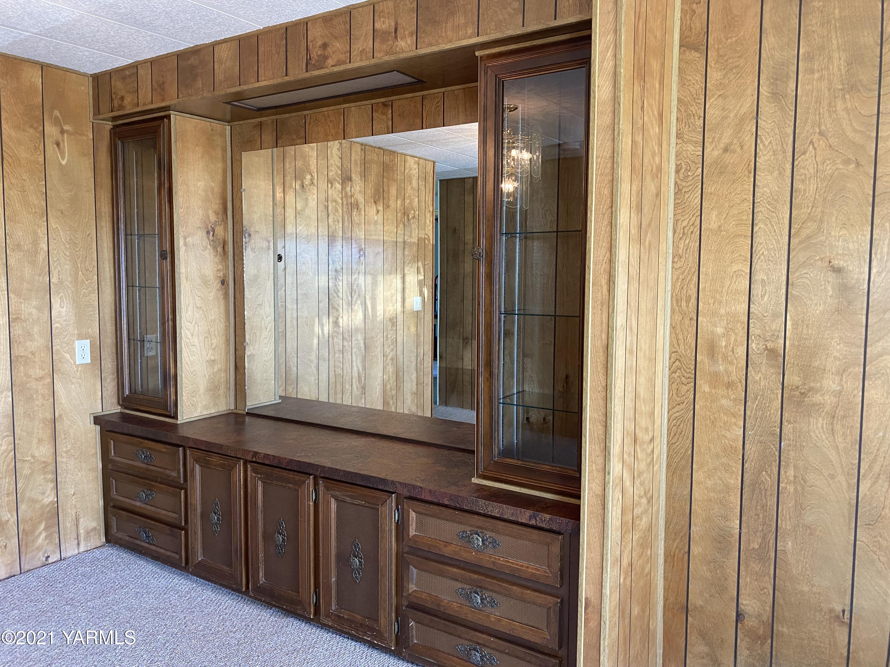 363 Riggins Road Wapato, WA 98951 - Photo 4 of 14 a bathroom with a glass door shower and a sink