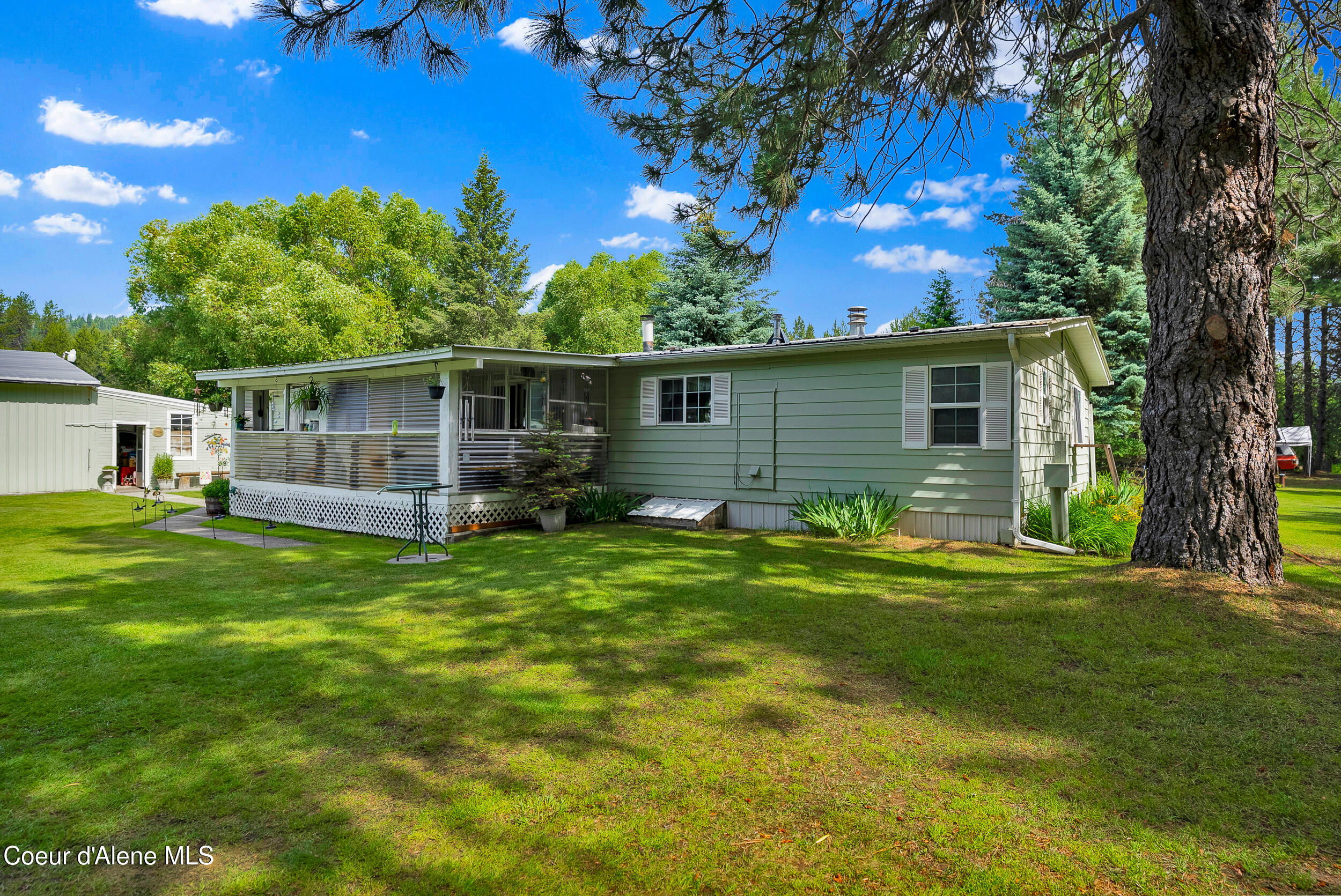 443 Herrmann Lake Road Sagle, ID 83860 - Photo 24 of 47 34 - Herrmann Lake rear