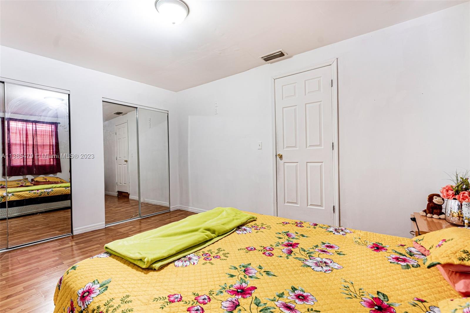 8241 Southwest 37th Street Miami, FL 33155 - Photo 21 of 46 a bedroom with a bed and a couch