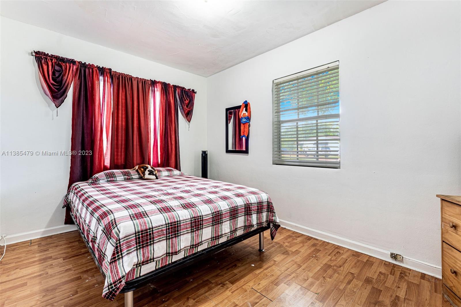 8241 Southwest 37th Street Miami, FL 33155 - Photo 22 of 46 a bedroom with a bed and a window