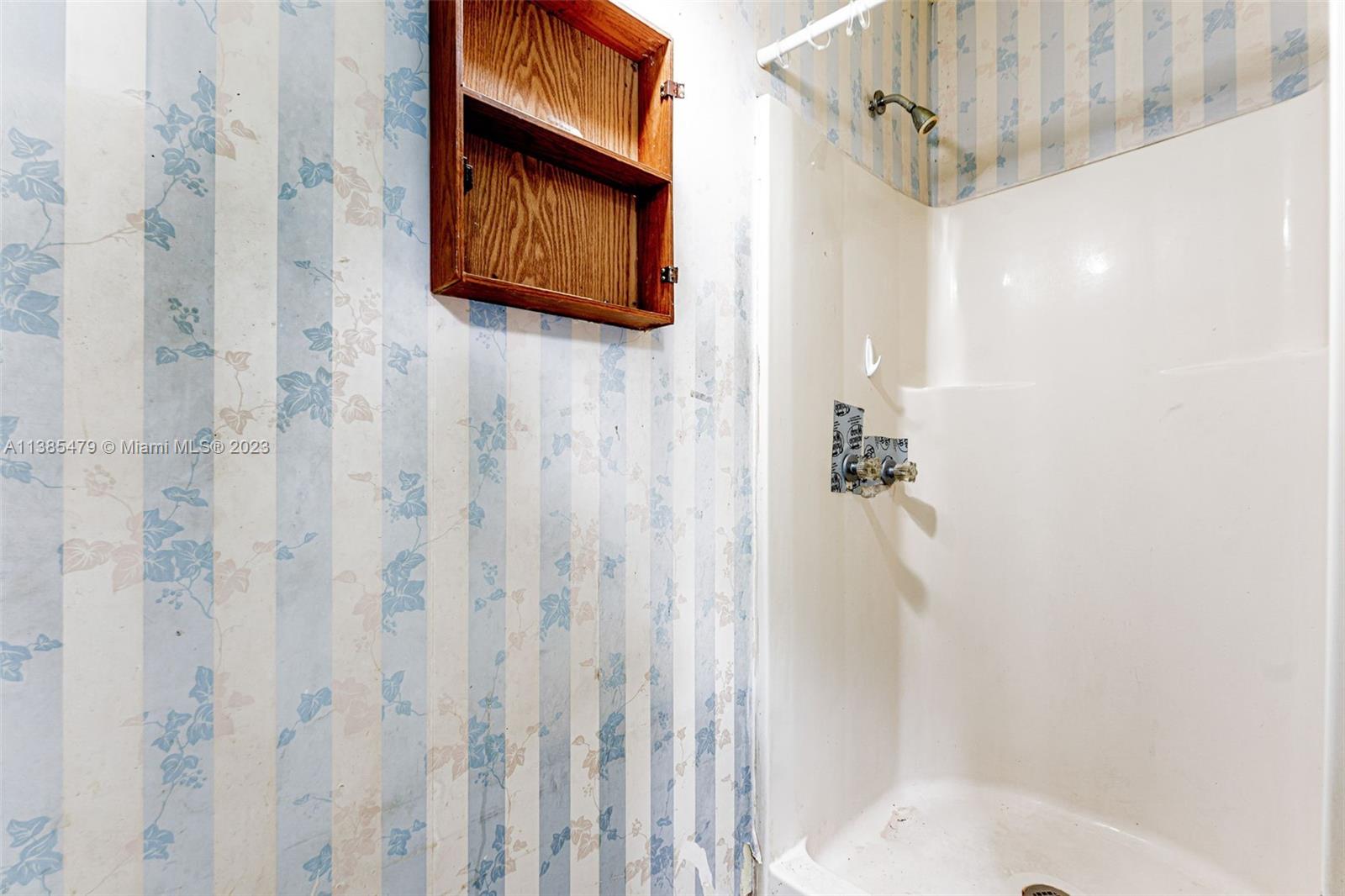 8241 Southwest 37th Street Miami, FL 33155 - Photo 33 of 46 a bathroom with a shower