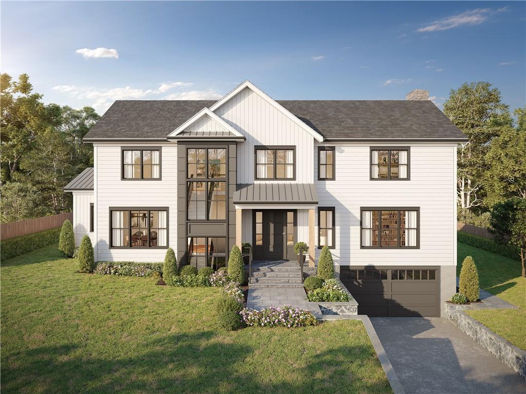 9 Hook Road Rye, NY 10580 - Photo 1 of 1 a front view of a house with a yard