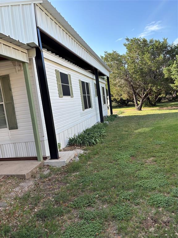 206 Holiday Rambler Drive Whitney, TX 76692 - Photo 3 of 28 This lot has SPACE on both sides and sensational natural path behind property
