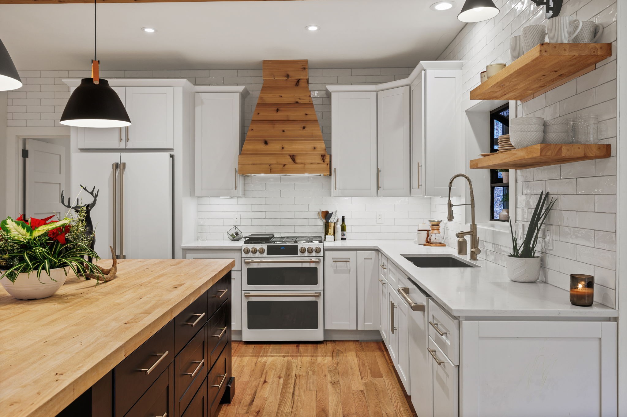 3945 New Highway 96 West Franklin, TN 37064 - Photo 15 of 69 a kitchen with a sink stove and cabinets