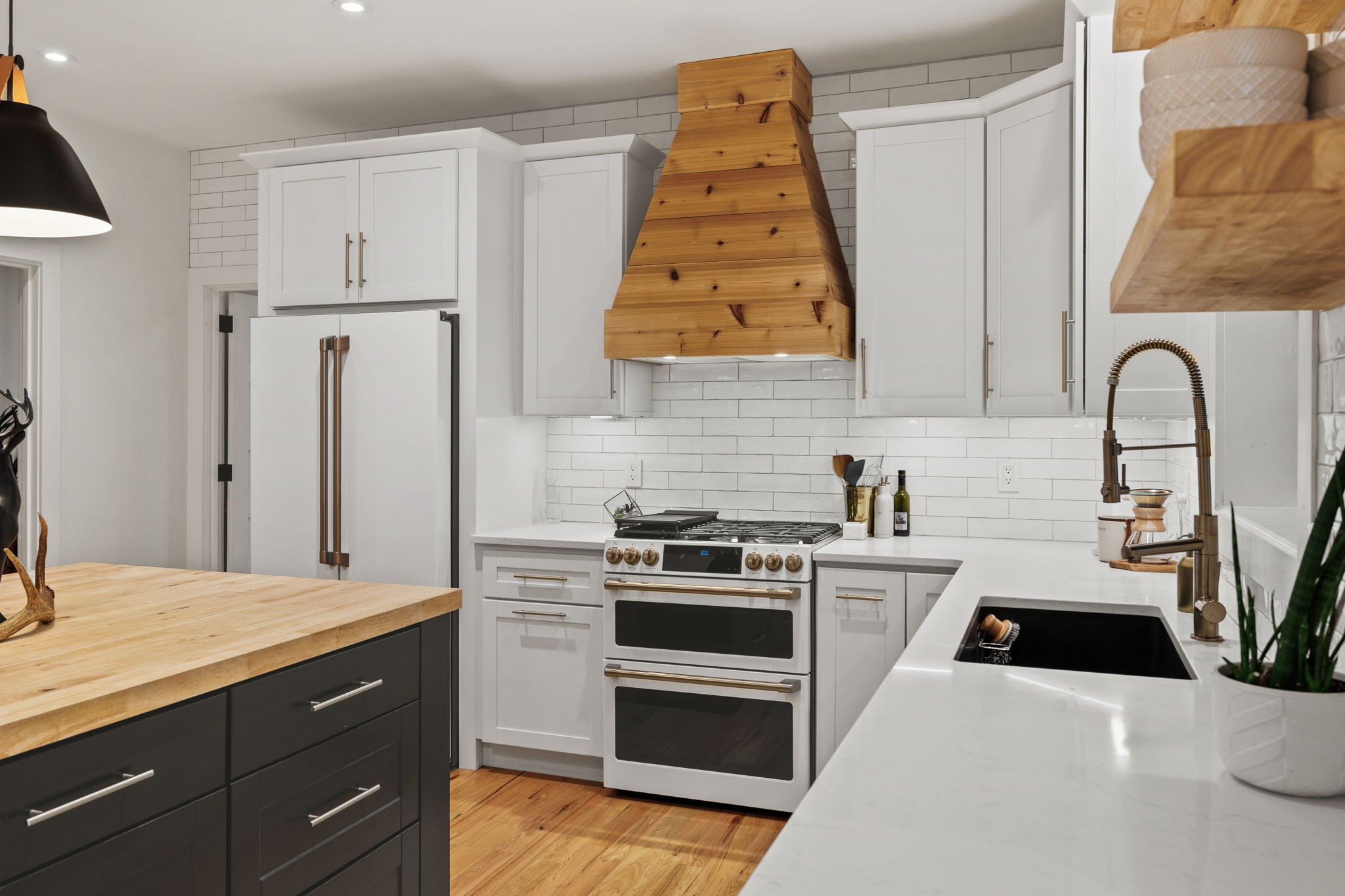 3945 New Highway 96 West Franklin, TN 37064 - Photo 16 of 69 a kitchen with a sink a stove and refrigerator