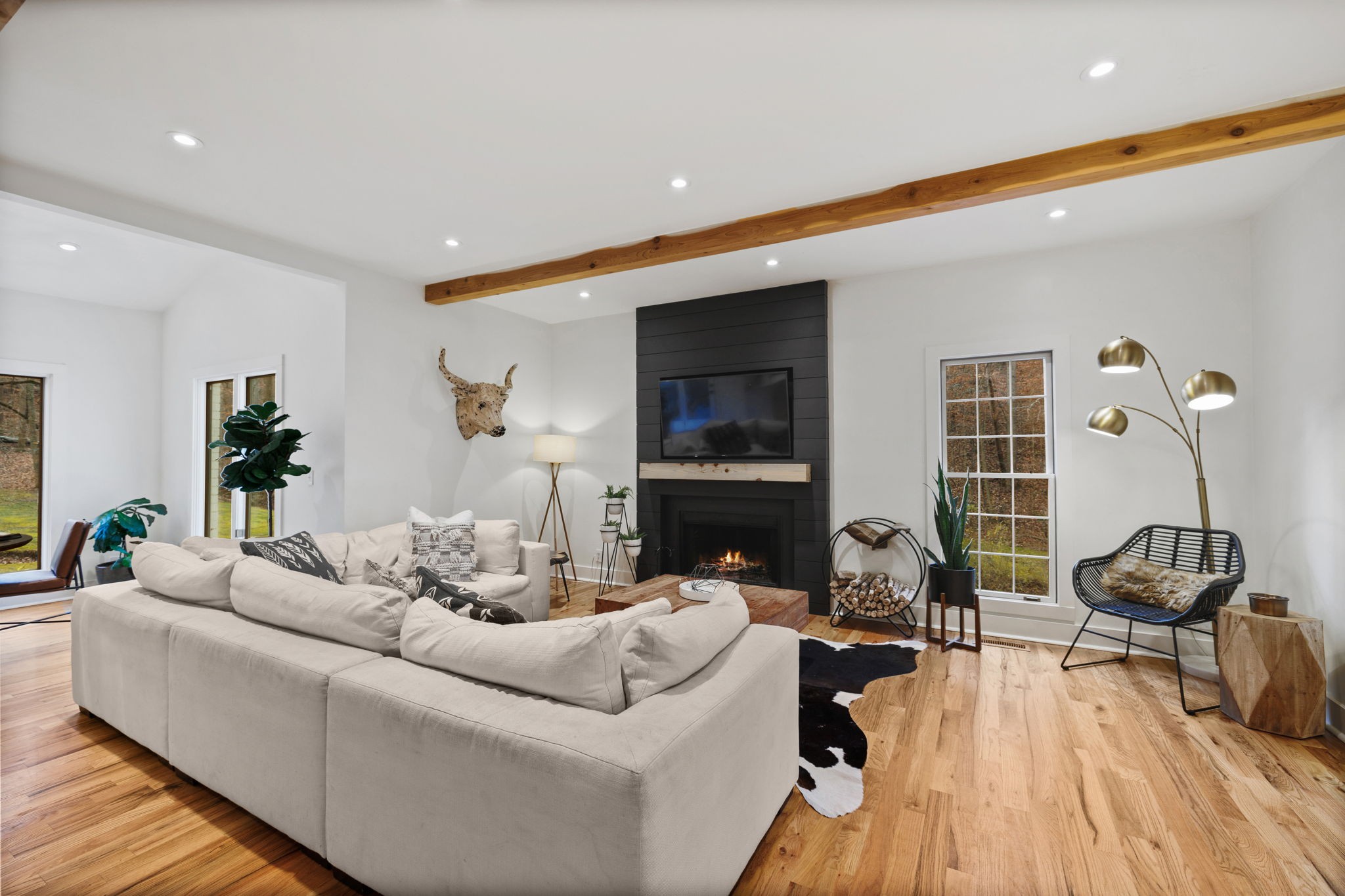 3945 New Highway 96 West Franklin, TN 37064 - Photo 25 of 69 a living room with furniture and a fireplace