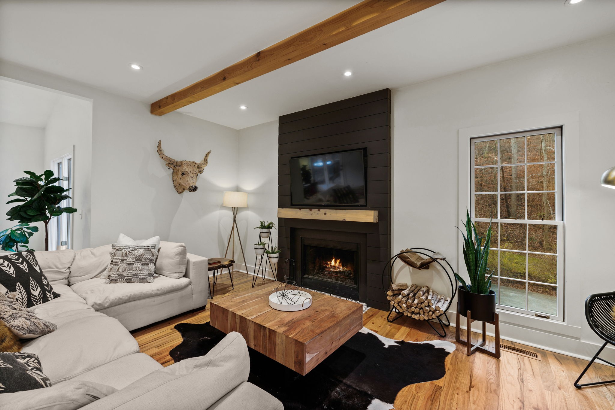3945 New Highway 96 West Franklin, TN 37064 - Photo 28 of 69 a living room with furniture and a fireplace