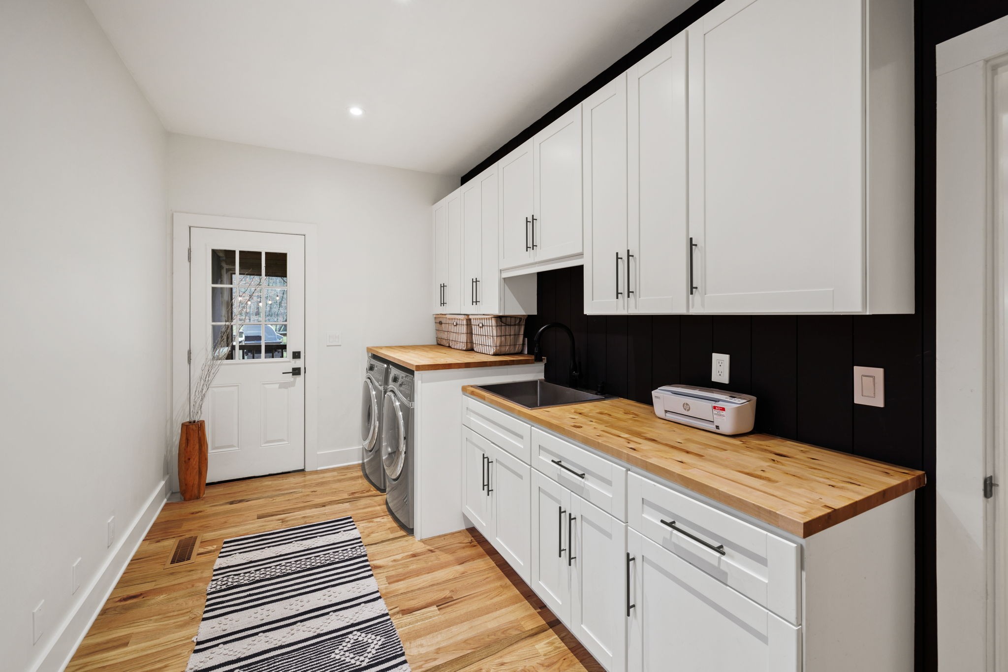 3945 New Highway 96 West Franklin, TN 37064 - Photo 31 of 69 a kitchen with a sink and cabinets