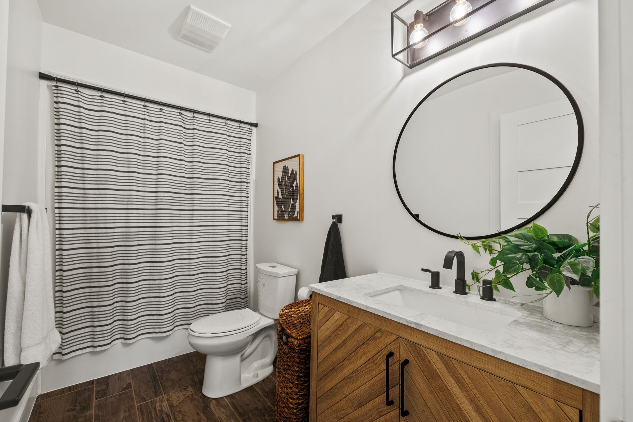 3945 New Highway 96 West Franklin, TN 37064 - Photo 40 of 69 a bathroom with a sink a toilet and a mirror