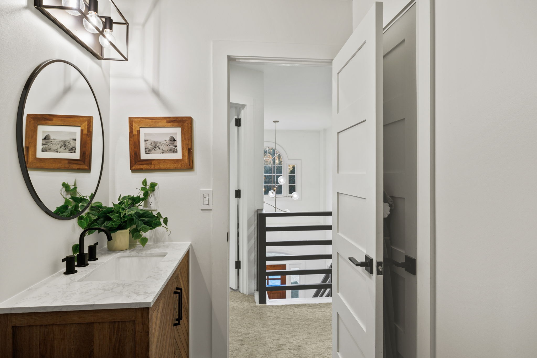 3945 New Highway 96 West Franklin, TN 37064 - Photo 41 of 69 a view of a hallway with paintings on the wall