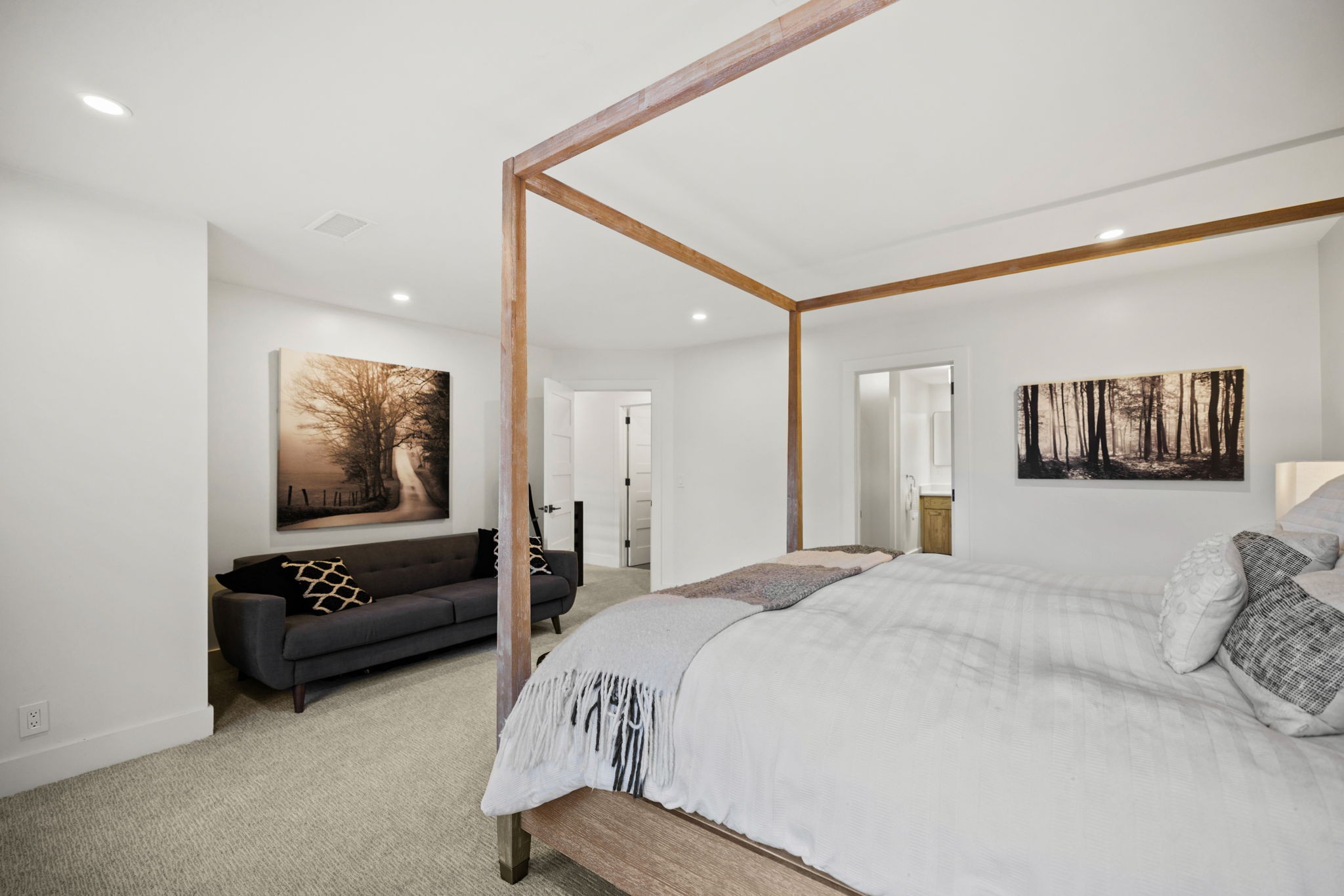 3945 New Highway 96 West Franklin, TN 37064 - Photo 46 of 69 a spacious bedroom with a bed a couch and dresser