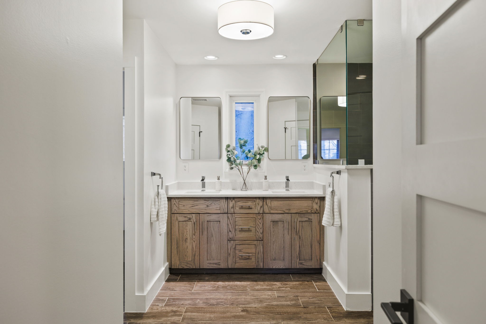 3945 New Highway 96 West Franklin, TN 37064 - Photo 48 of 69 a spacious bathroom with a double vanity sink and a mirror