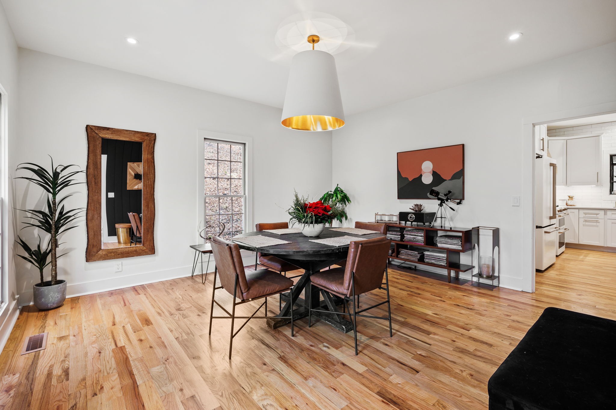 3945 New Highway 96 West Franklin, TN 37064 - Photo 7 of 69 a living room with furniture dining table and a flat screen tv