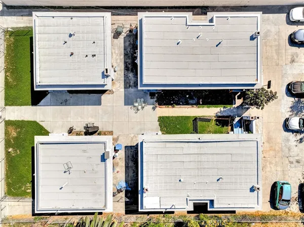 a aerial view of a house with a yard