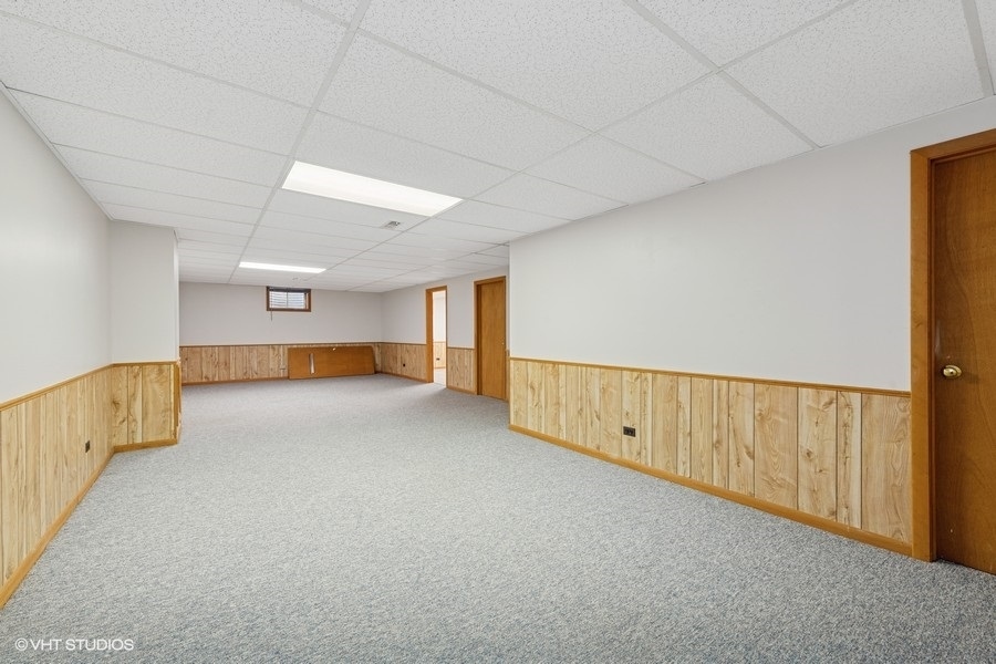 544 Arthur Drive Cary, IL 60013 - Photo 18 of 23 a view of an empty room with a window