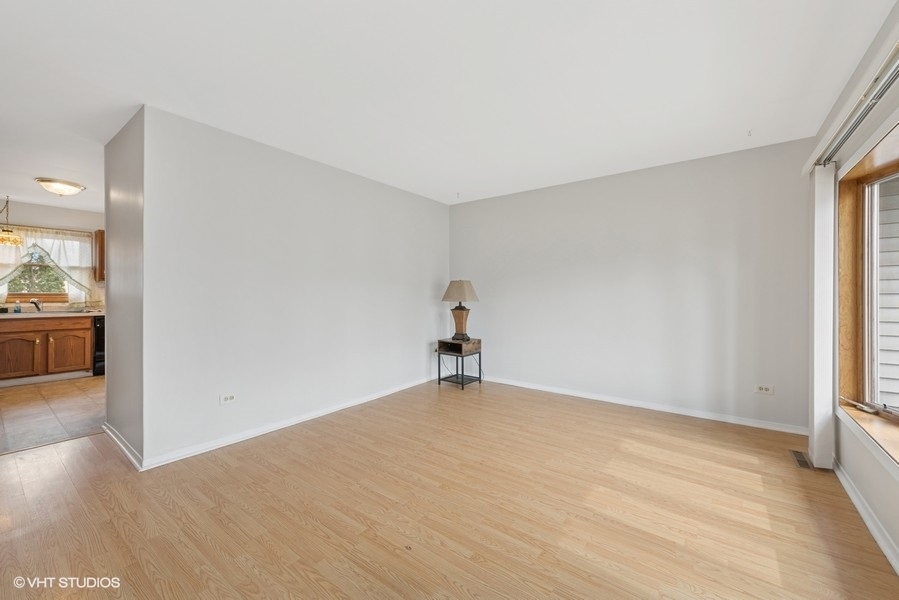 544 Arthur Drive Cary, IL 60013 - Photo 4 of 23 a view of an empty room and window