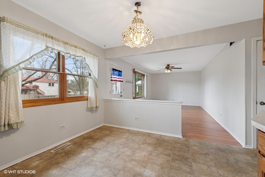 544 Arthur Drive Cary, IL 60013 - Photo 7 of 23 a view of empty room with window