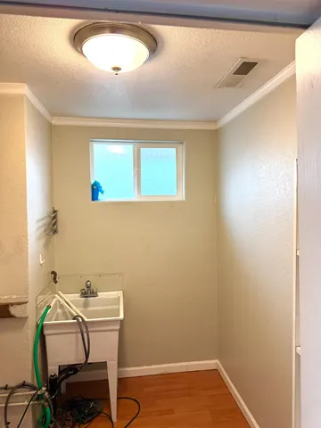 a room with a table and chairs