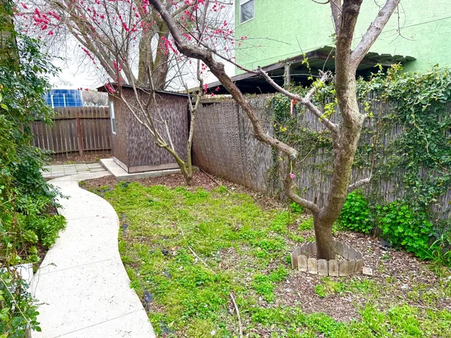 a backyard of a house with lots of green space