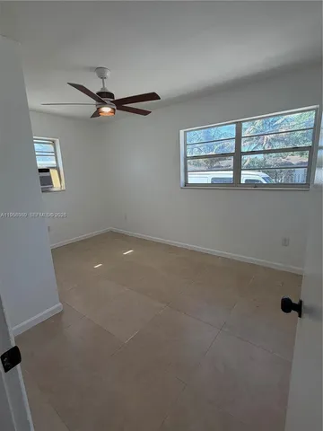 a view of a room with a window