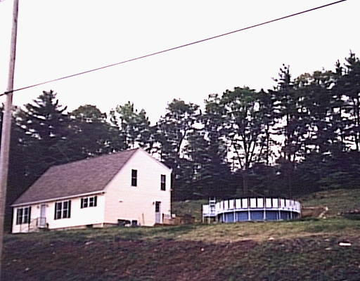 345 Brook Road Warren, MA 01092 - Photo 1 of 1 a view of a house with a street