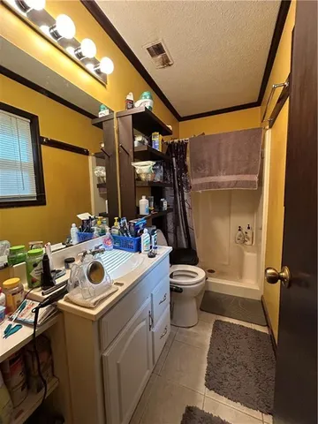 a room with sink dryer and washer
