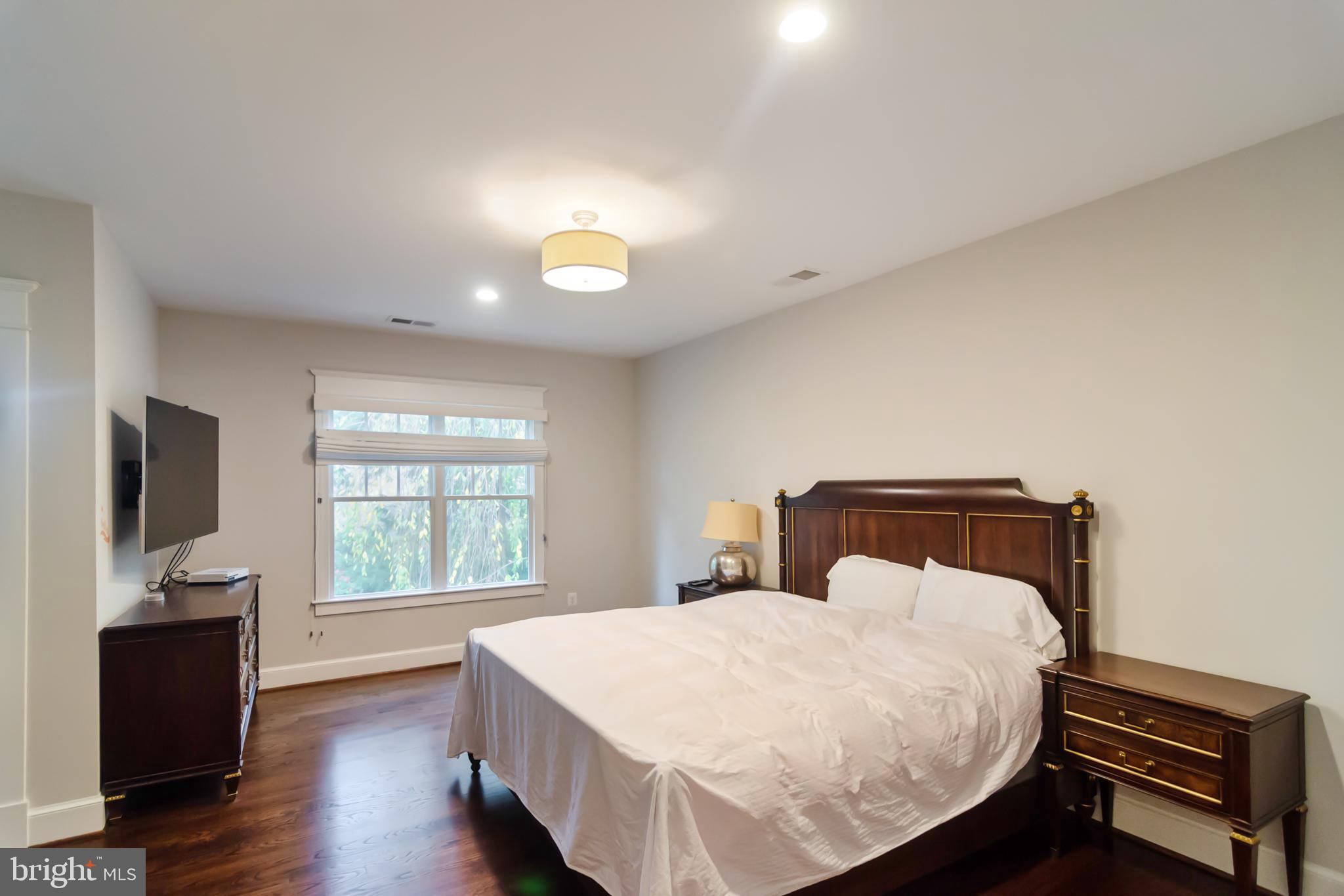 6801 Danforth Street McLean, VA 22101 - Photo 21 of 29 a bed room with a bed and a television