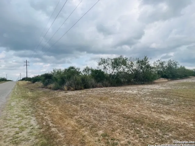 a view of a big yard with an empty space