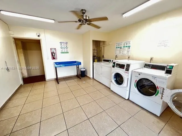 a view of a storage & utility room with washer and dryer