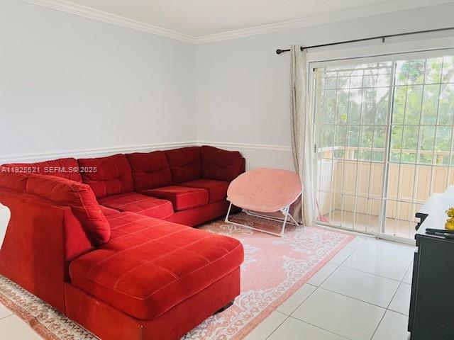 17530 Northwest 68th Avenue, Unit C2007 Hialeah, FL 33015 - Photo 8 of 18 a living room with furniture and a rug