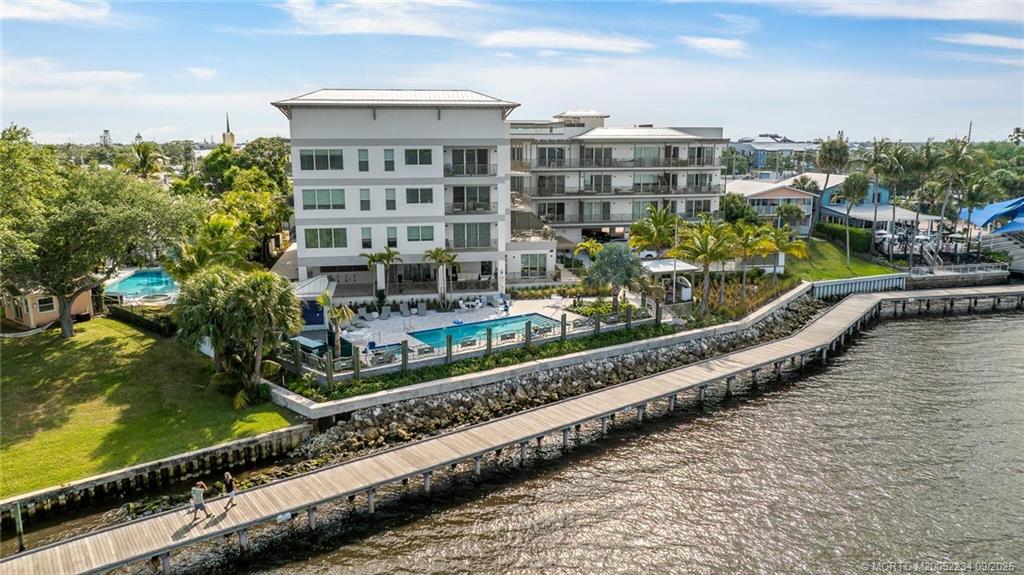 Undisclosed Address Stuart, FL 34994 - Photo 2 of 58 a view of a city with tall buildings