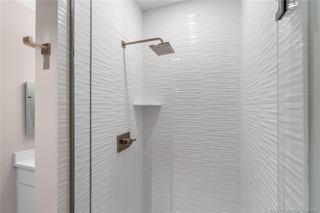 Undisclosed Address Stuart, FL 34994 - Photo 27 of 58 a bathroom with a shower