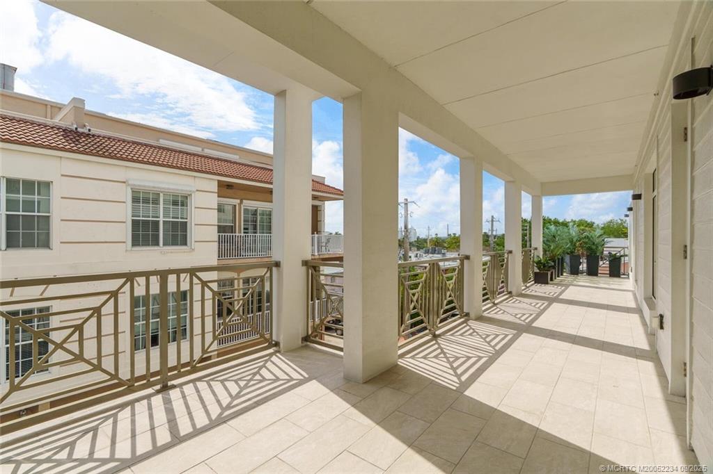 Undisclosed Address Stuart, FL 34994 - Photo 46 of 58 a view of a balcony with wooden floor