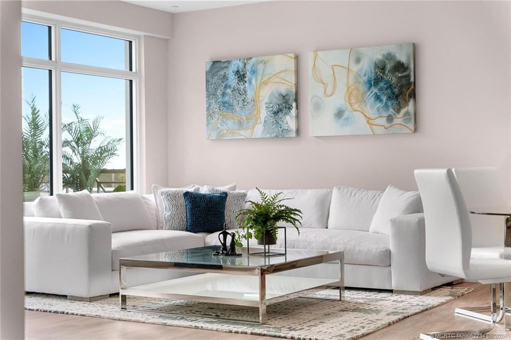 Undisclosed Address Stuart, FL 34994 - Photo 55 of 58 a living room with furniture and a potted plant