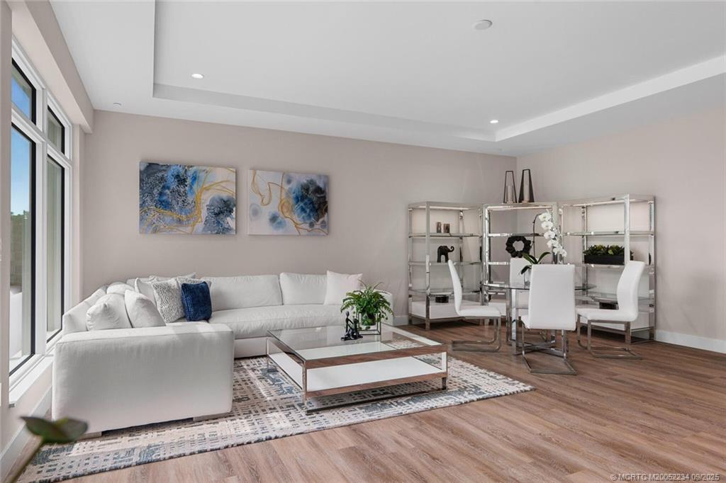 Undisclosed Address Stuart, FL 34994 - Photo 8 of 58 a living room with furniture and wooden floor