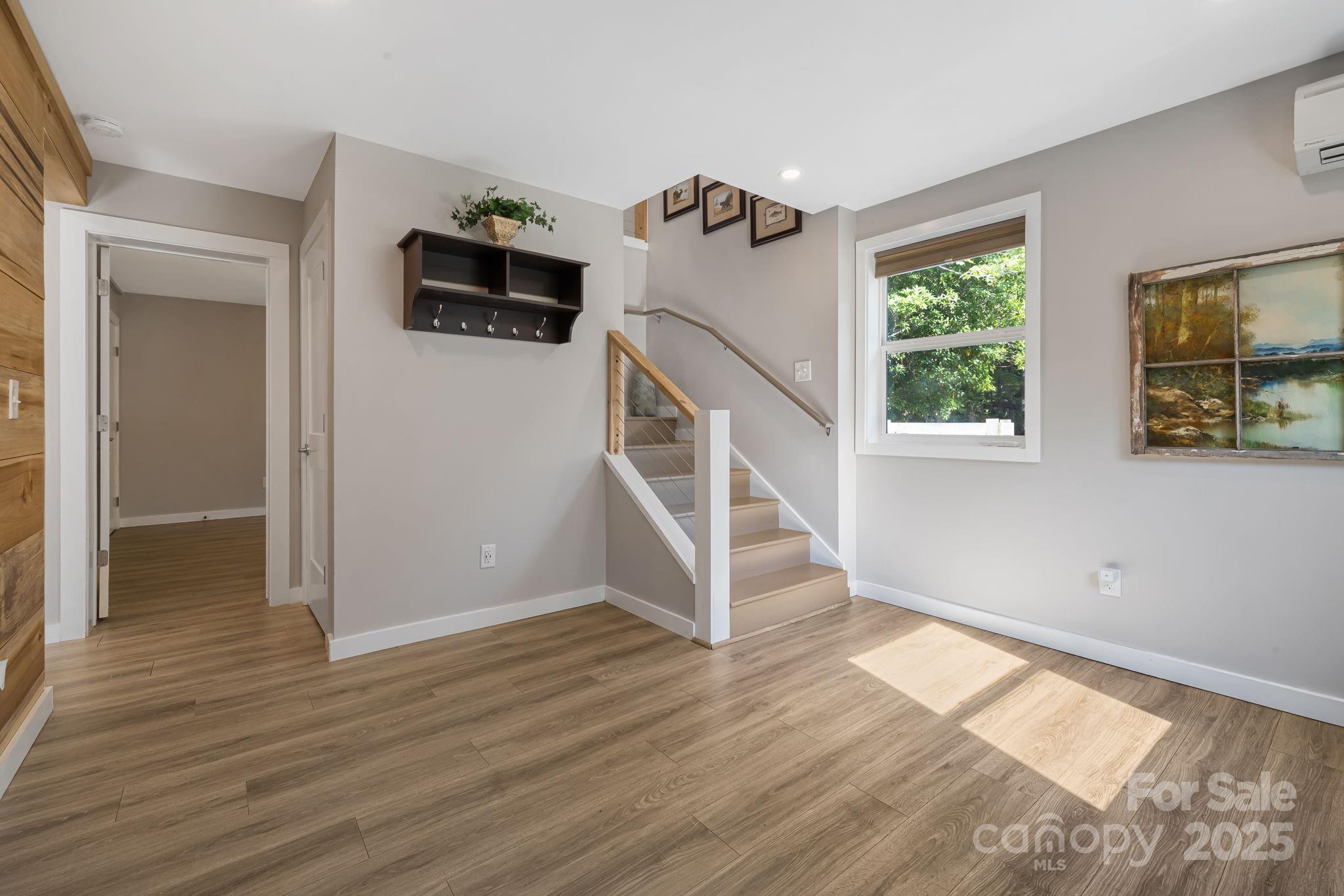1101 Line Runner Ridge Road Rosman, NC 28772 - Photo 21 of 47 a view of an entryway with wooden floor and livingroom