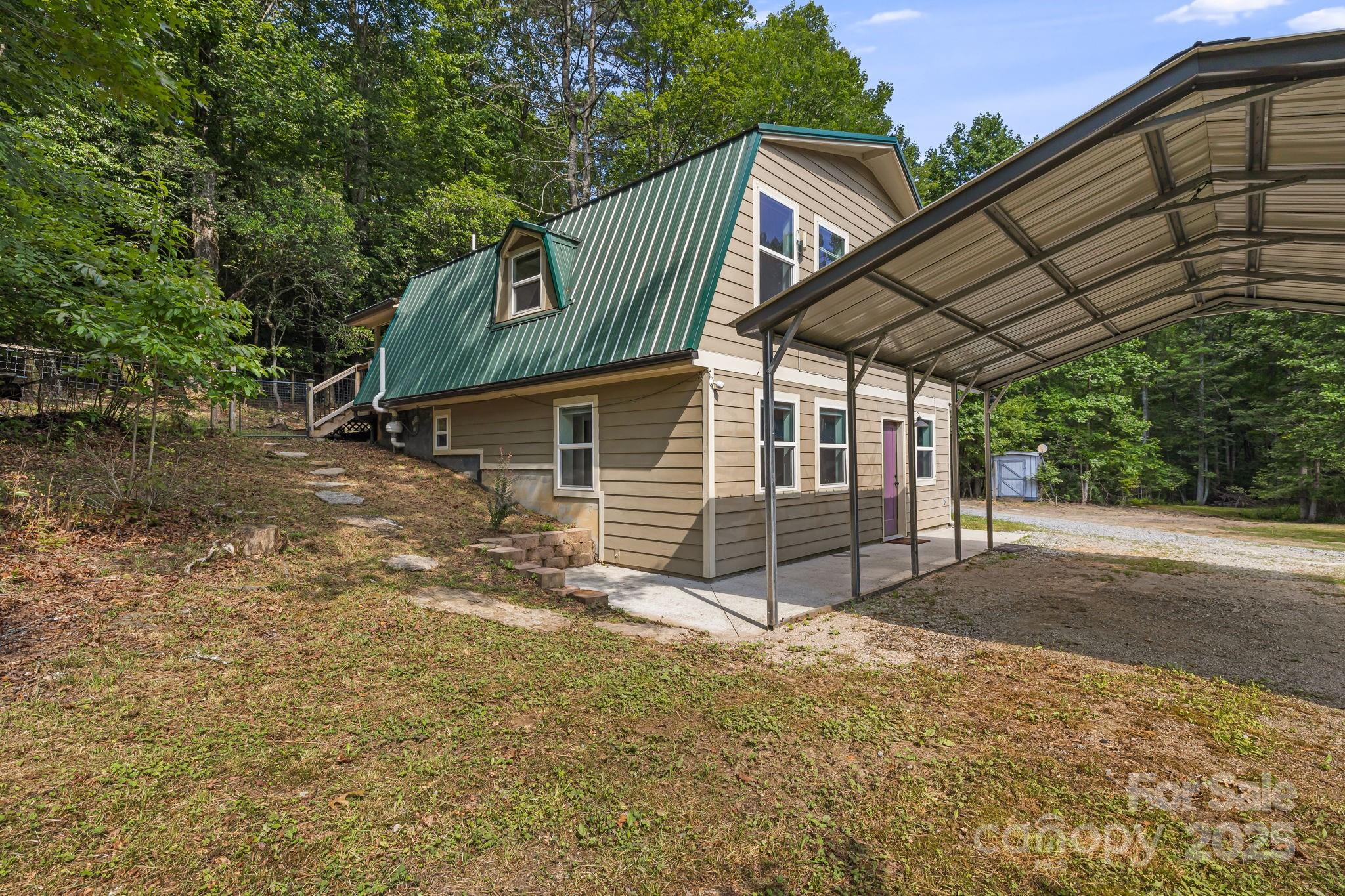 1101 Line Runner Ridge Road Rosman, NC 28772 - Photo 31 of 47 a view of a house with a yard